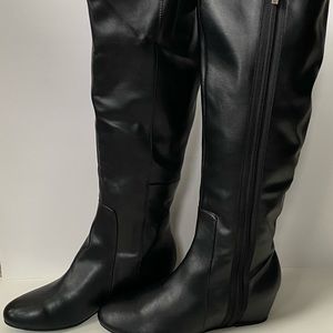 Black leather boots.